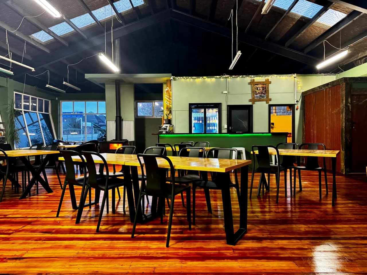 The Farmer's Grill function room with tables, fireplace and private bar