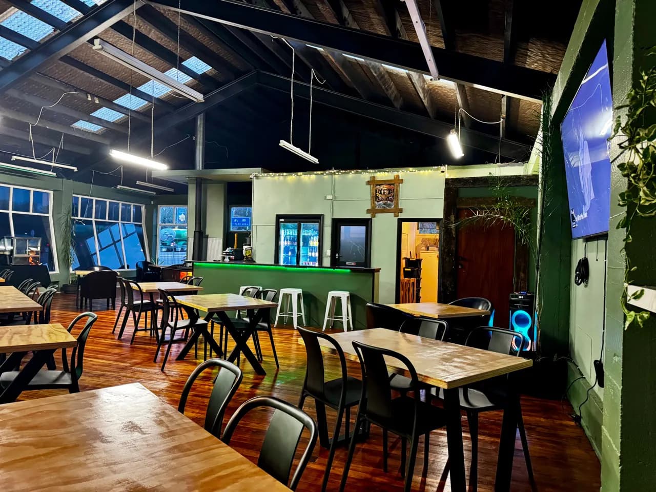 Function room seating with the television and private bar