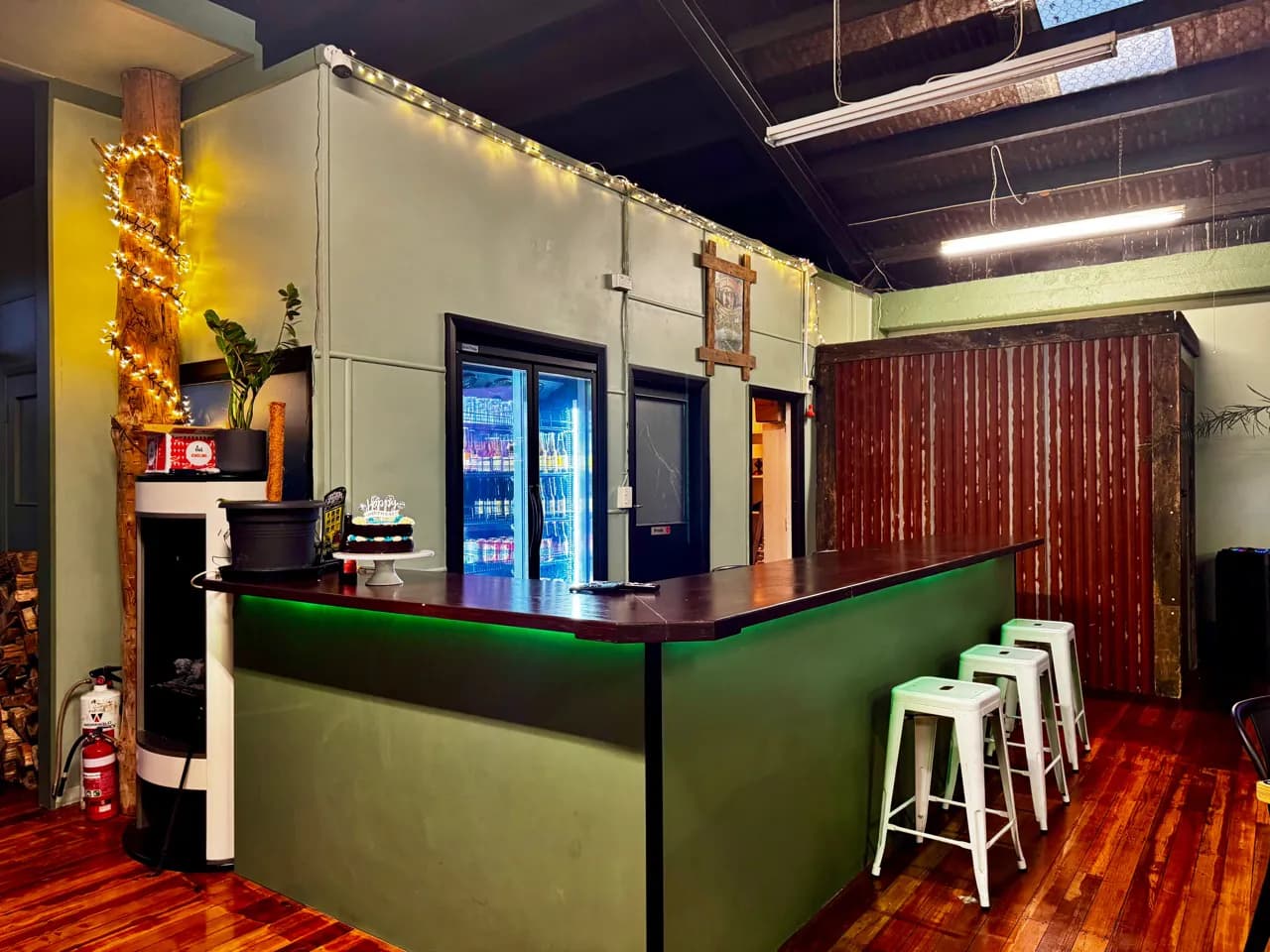 Private function room bar with stools and drinks fridge